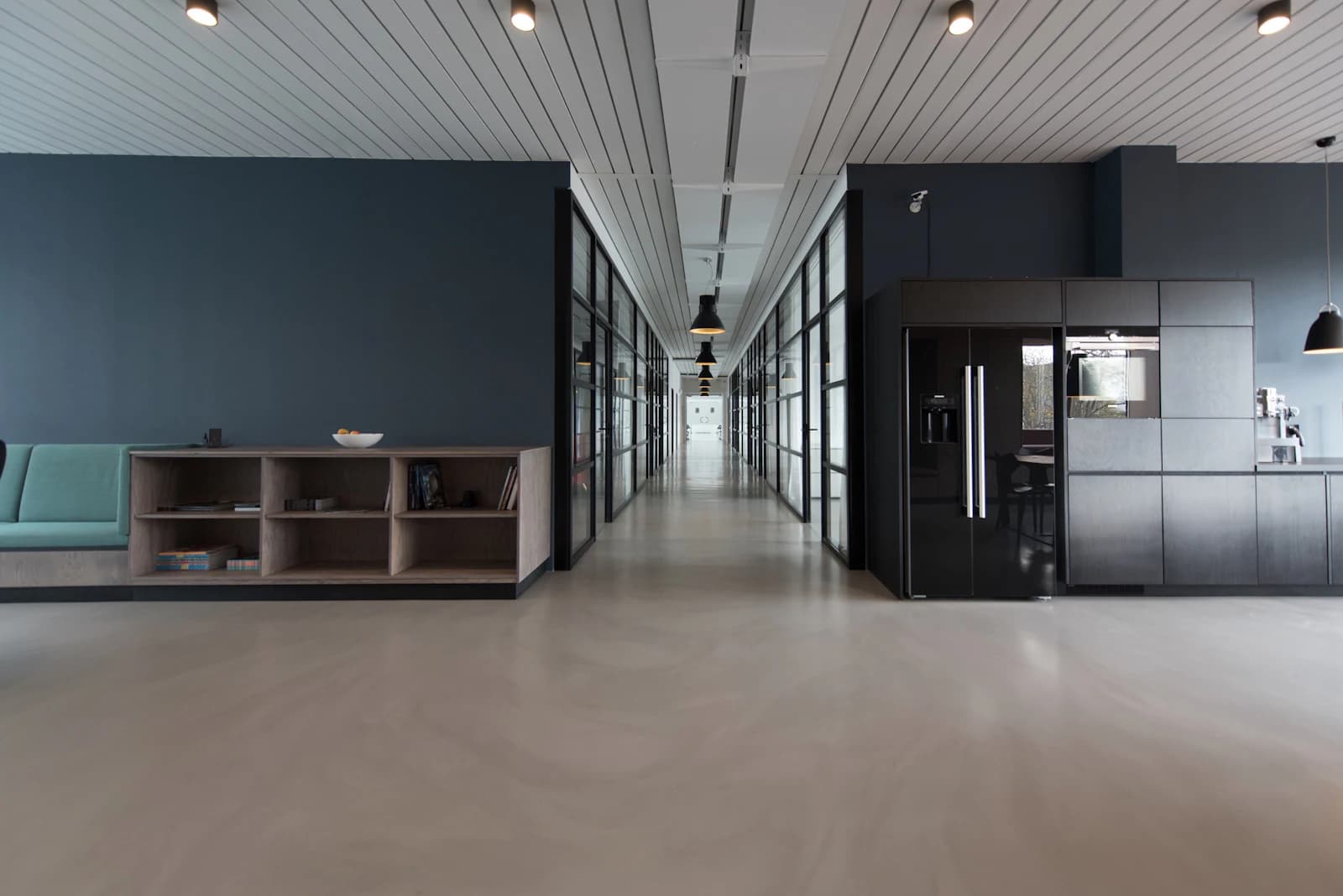 A quiet, modern office corridor